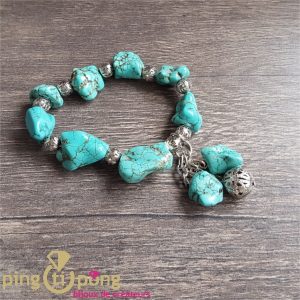 Bracelet  pierres turquoises et breloques